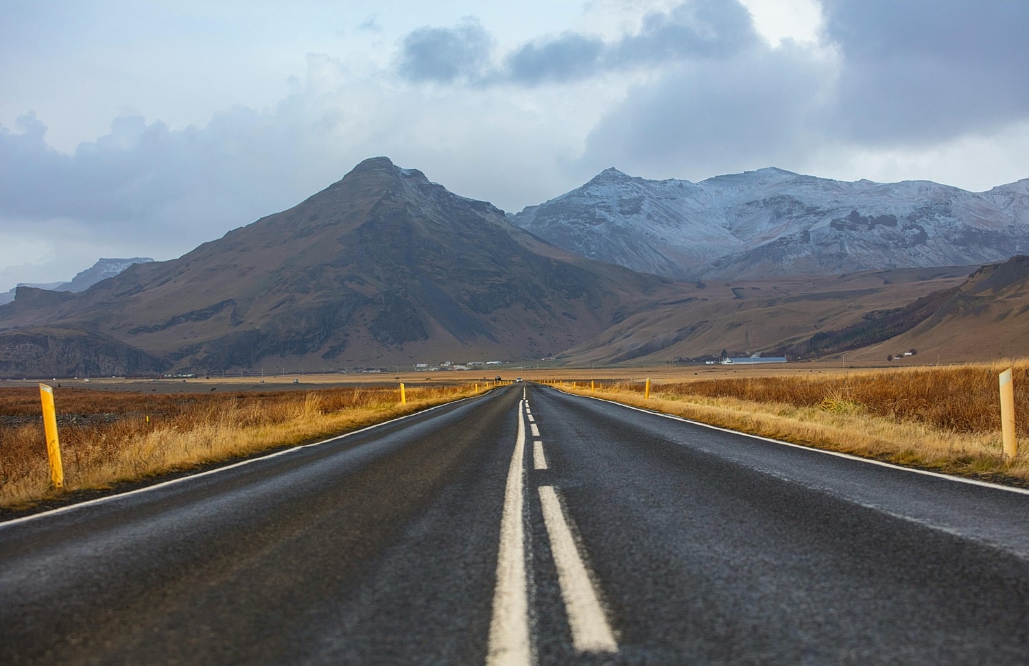 Scenic road with mountains in the background.