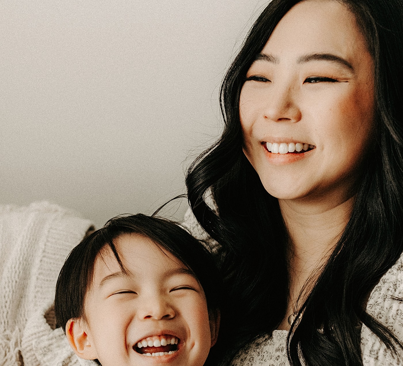Happy mother and child sharing a joyful moment.