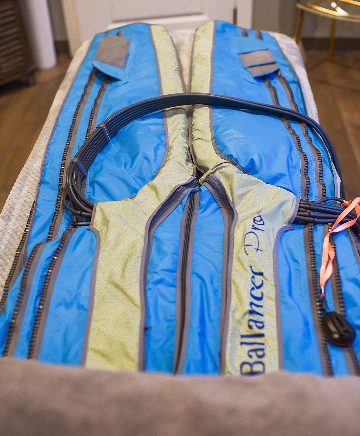 Body compression therapy equipment on a table.