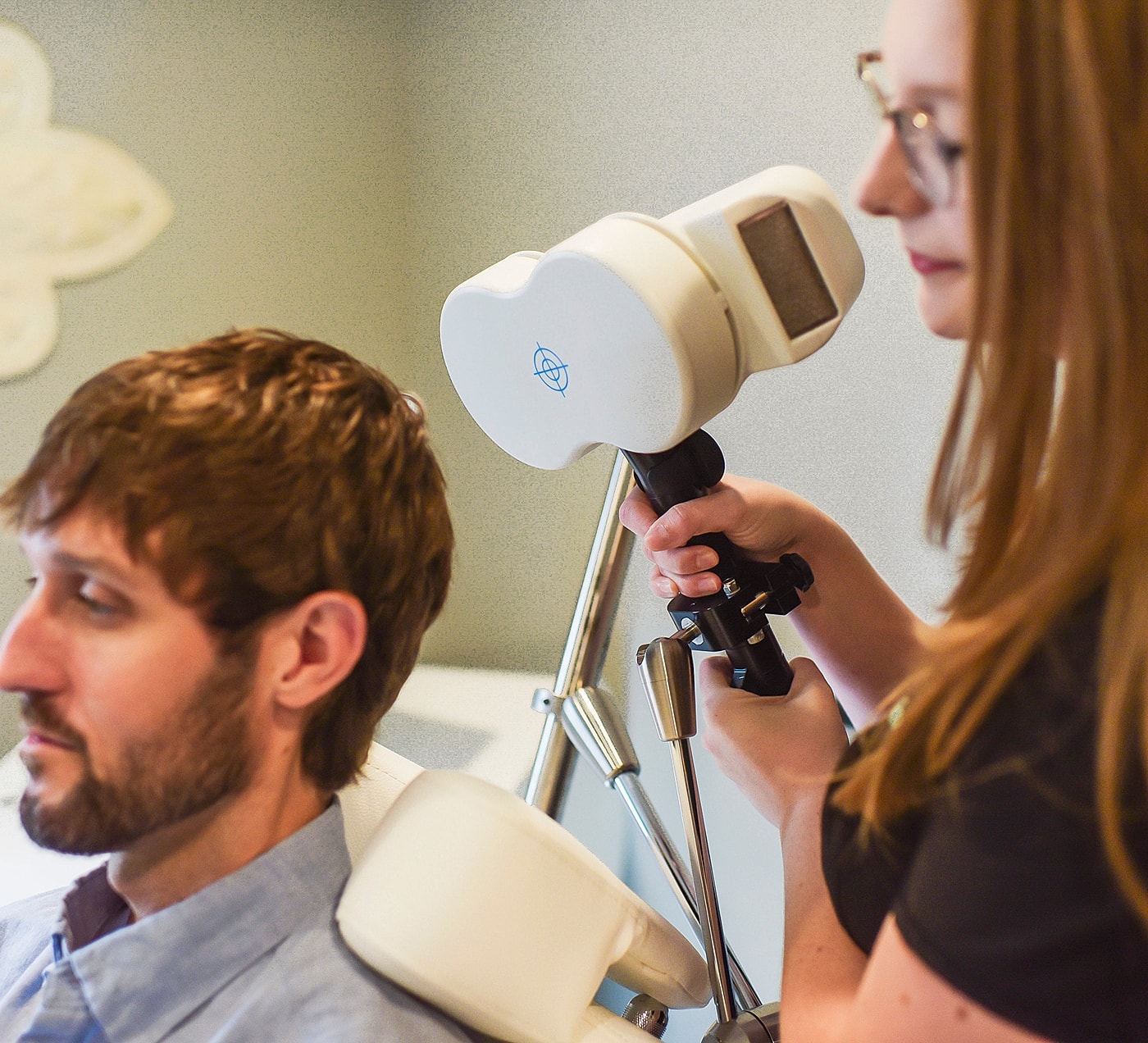 Patient receiving treatment with medical equipment.
