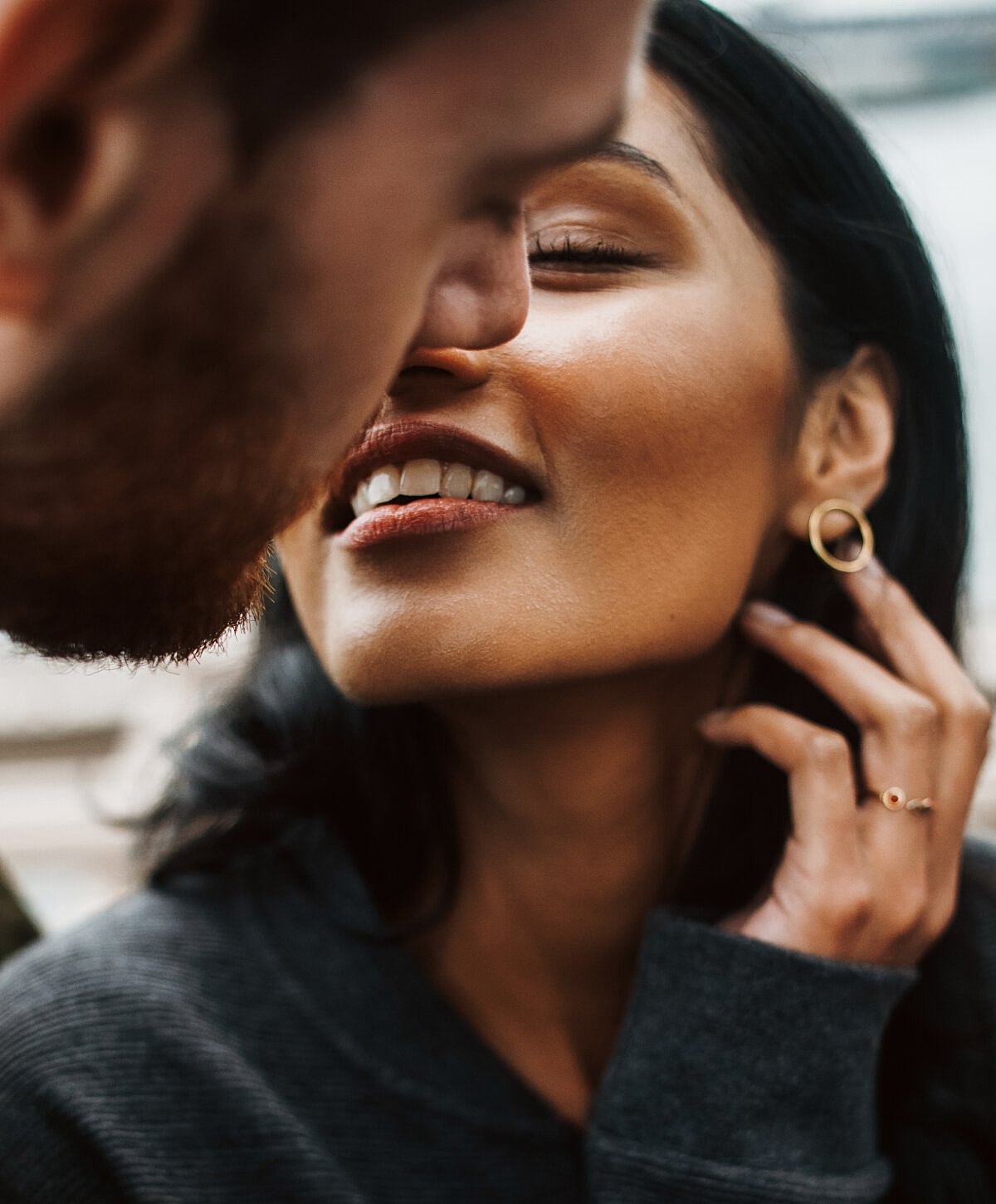 Close-up of intimate couple sharing a moment.