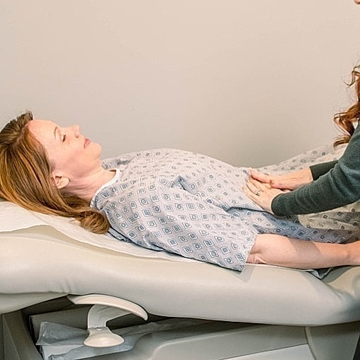 Patient consultation in a medical office setting.
