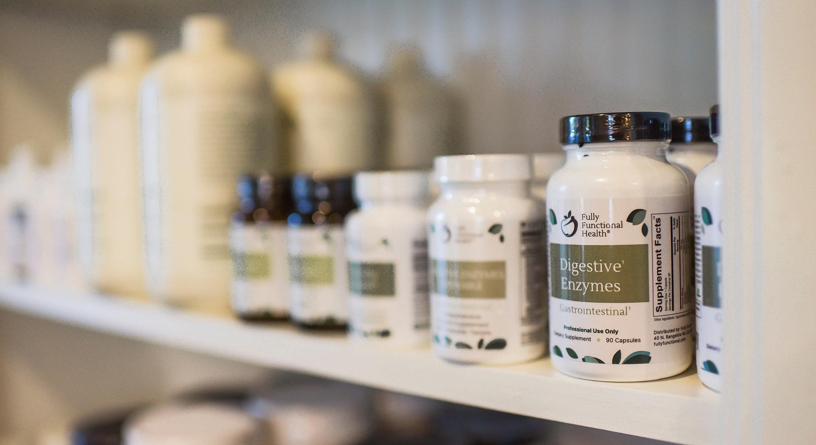 Shelves filled with health supplements and enzymes.