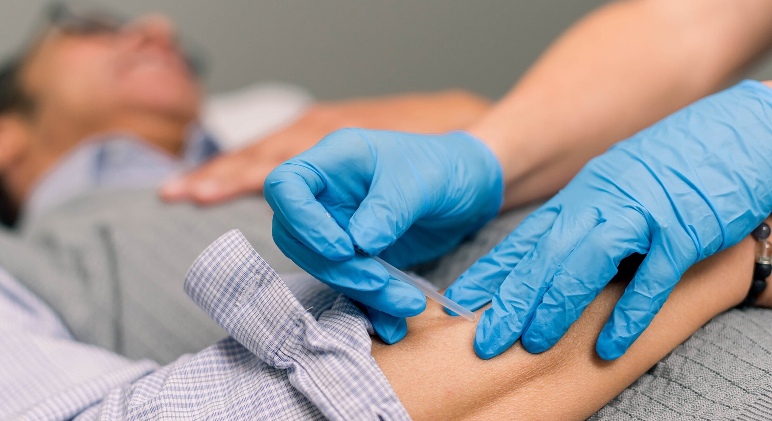 Healthcare professional administering a vaccine.