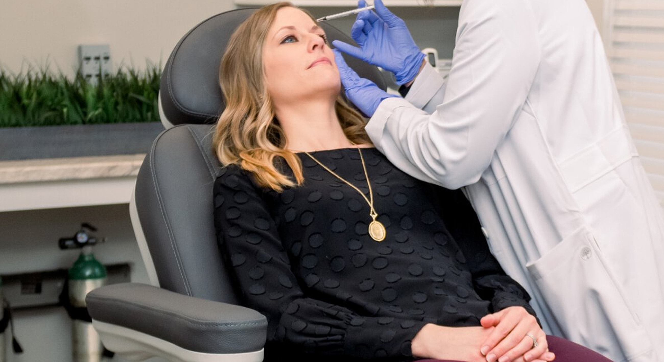 Patient receiving cosmetic treatment in clinic setting.