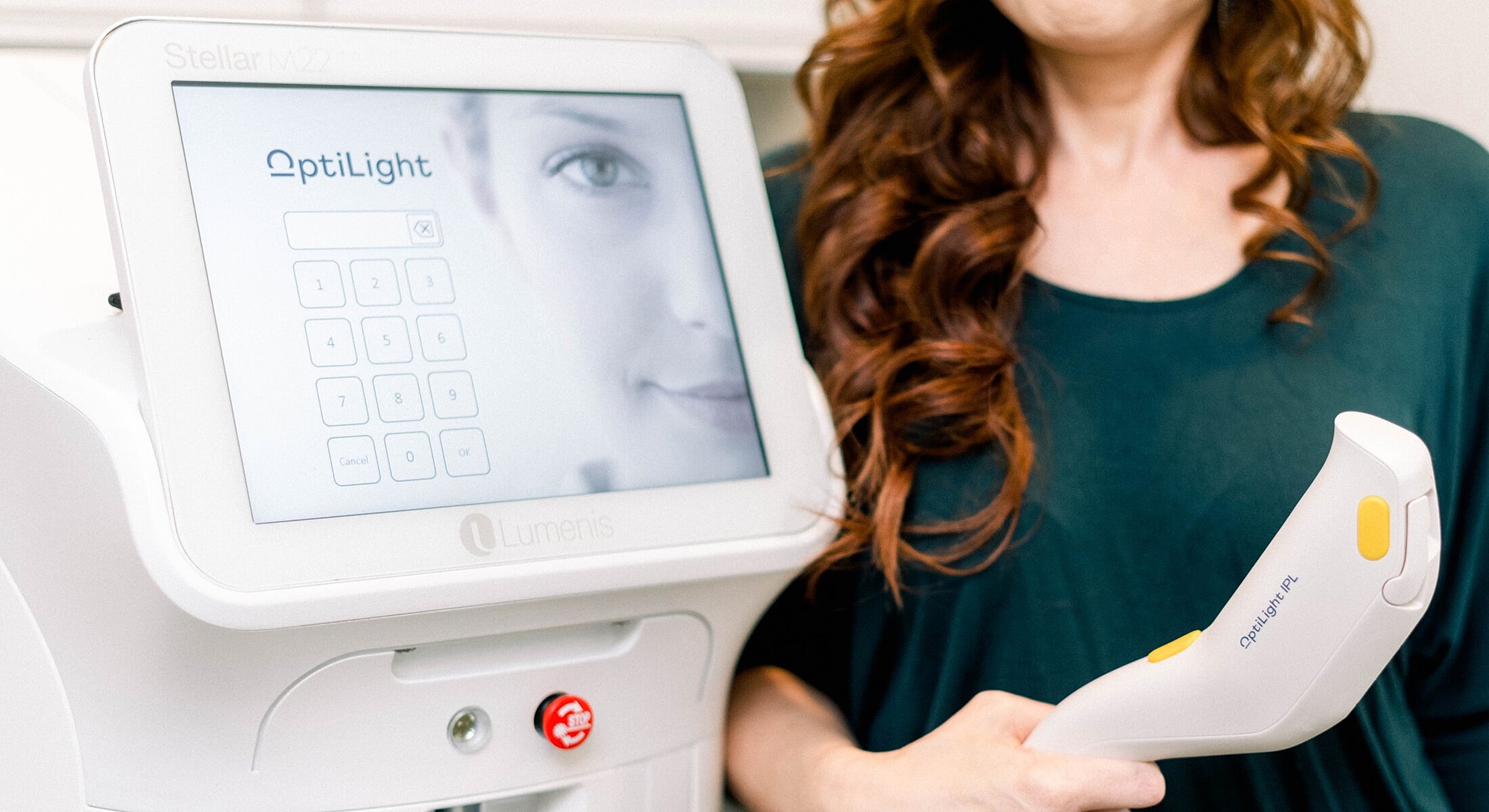 OptiLight machine and hand piece in use