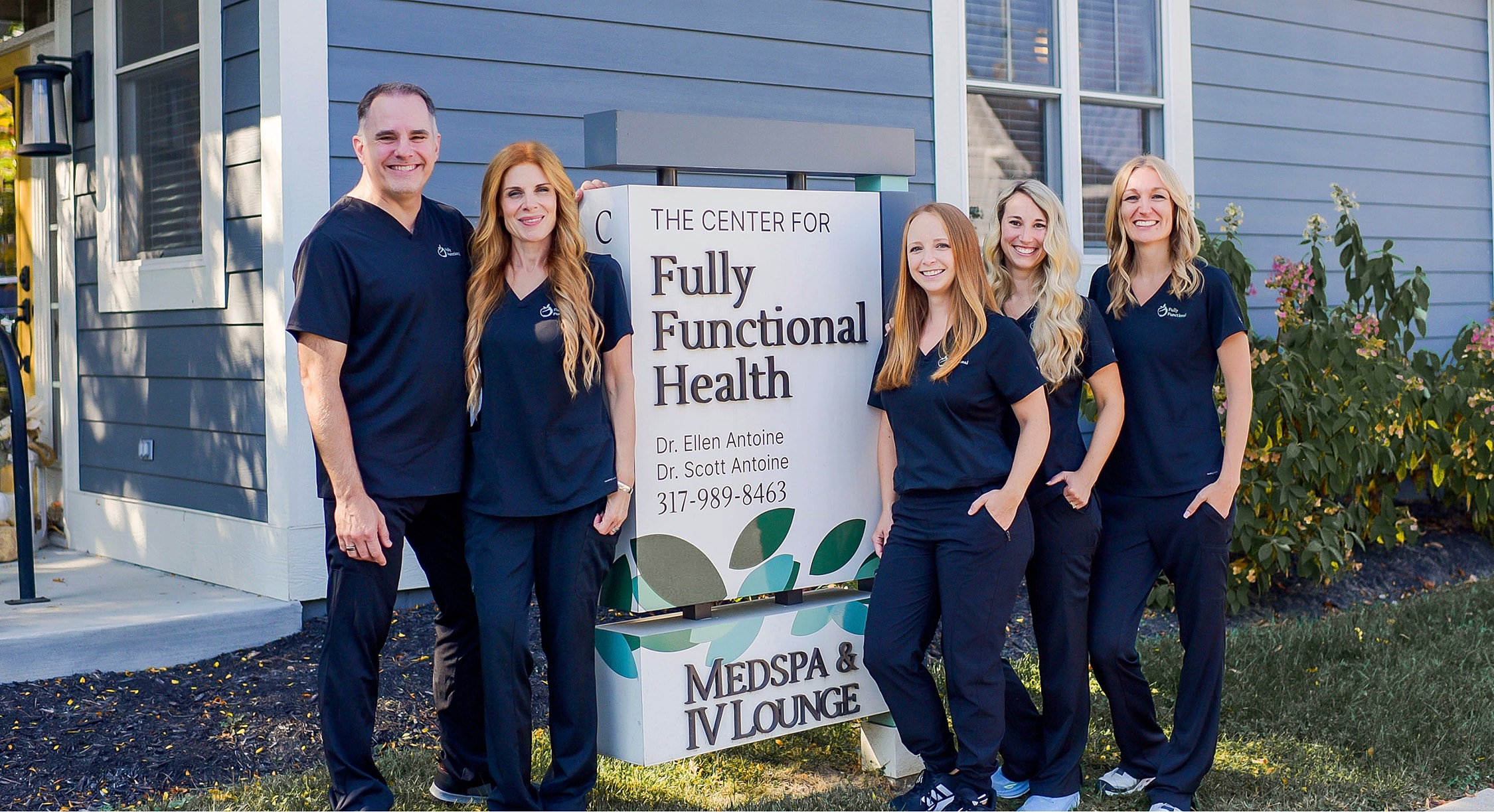 Medical team outside Fully Functional Health center.