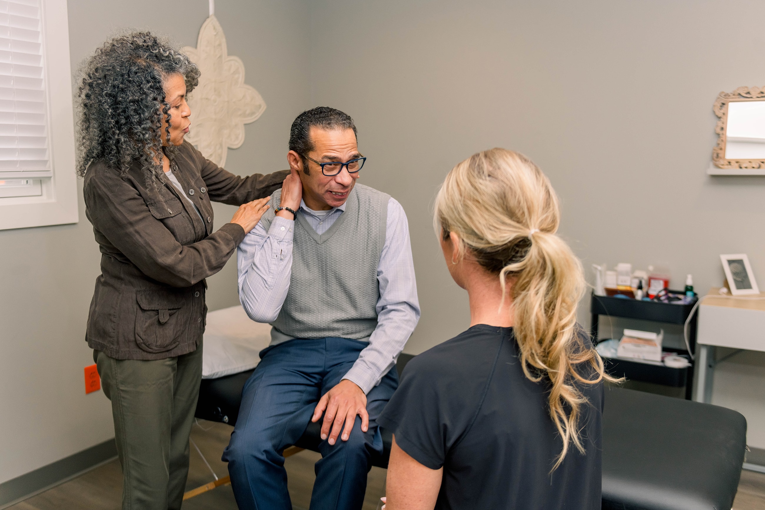 Patient consultation in a healthcare setting.